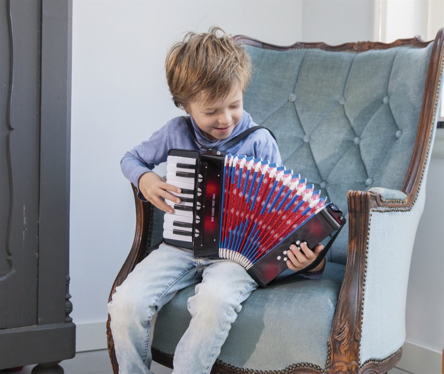 Accordion with music book - black | New Classic Toys